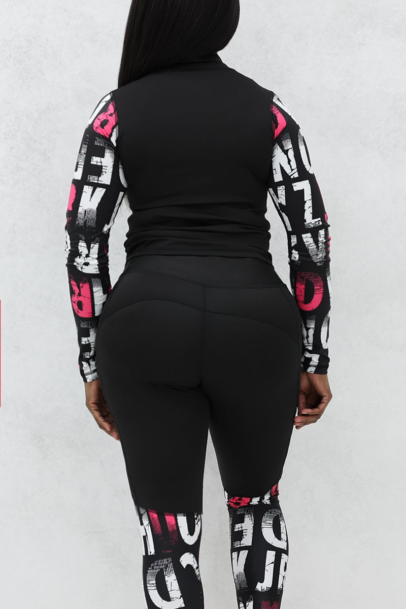 A woman wearing a pink and black School Half-Zip Pullover featuring a stretchy design, side pockets, and a half zipper, perfect for a stylish yet comfortable look.