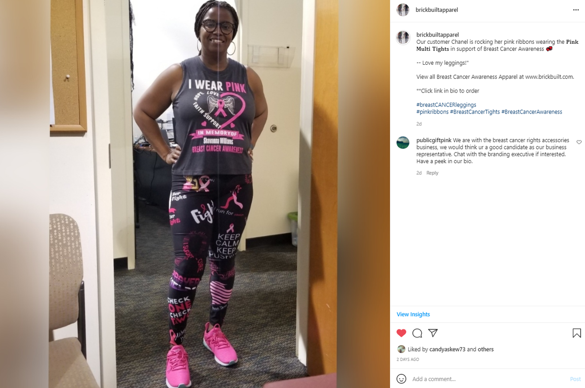 A woman wearing gray top and pink multi tights for breast cancer awareness along with pink shoes.