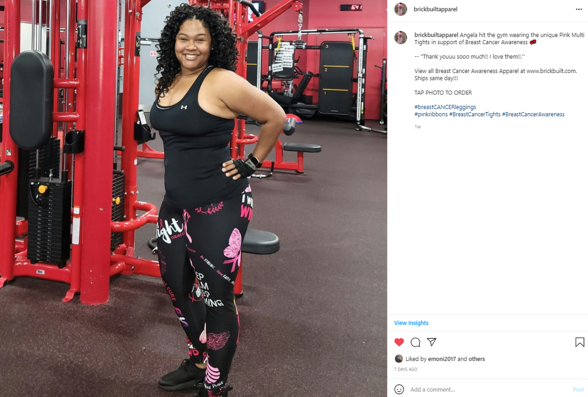 A woman in gym with black top and pink ribbon tights for breast cancer awareness.