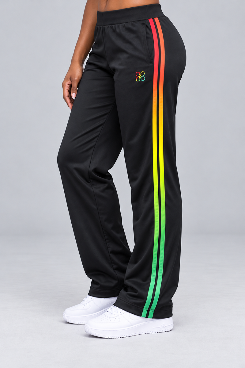 Black-multi Juneteenth sweatpants in a relaxed loose fit, featuring a red, yellow, and green gradient side stripe, an elastic waistband, and a small multicolored flower emblem on the hip.