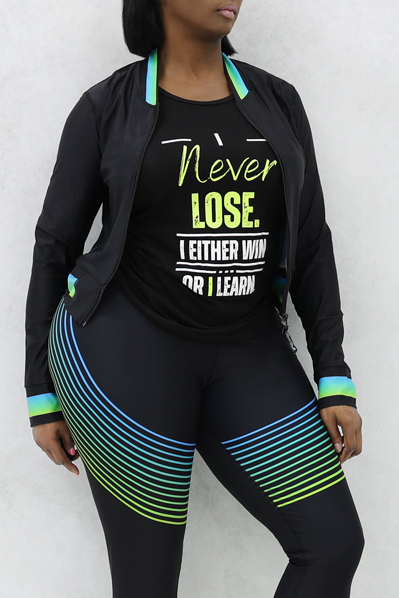 A woman wearing a black 'I Never Lose' tank top made of stretchy polyester and spandex.