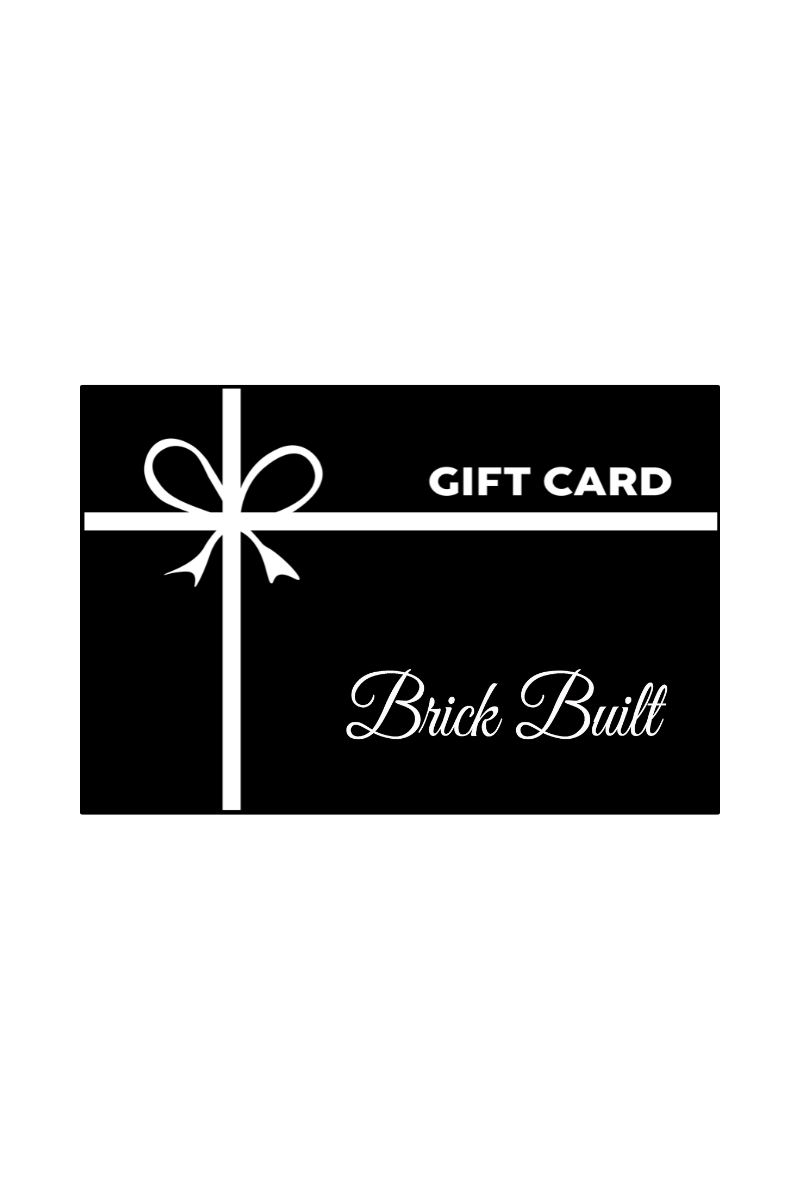 The Brick Built eGift card showcases a black design with a white ribbon and bow, "GIFT CARD" in bold white text, and Brick Built in cursive below—making it the perfect gift of choice for any occasion.