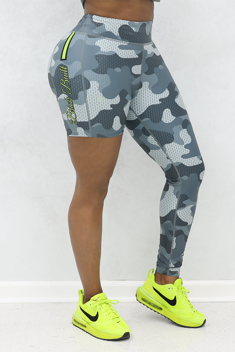 A woman wearing Grey and black camo one-legged tights featuring a unique design.