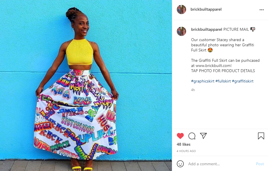 Our customer shared a multi-colored Graffiti full skirt with a vibrant print, featuring an elastic waist and tie belt.