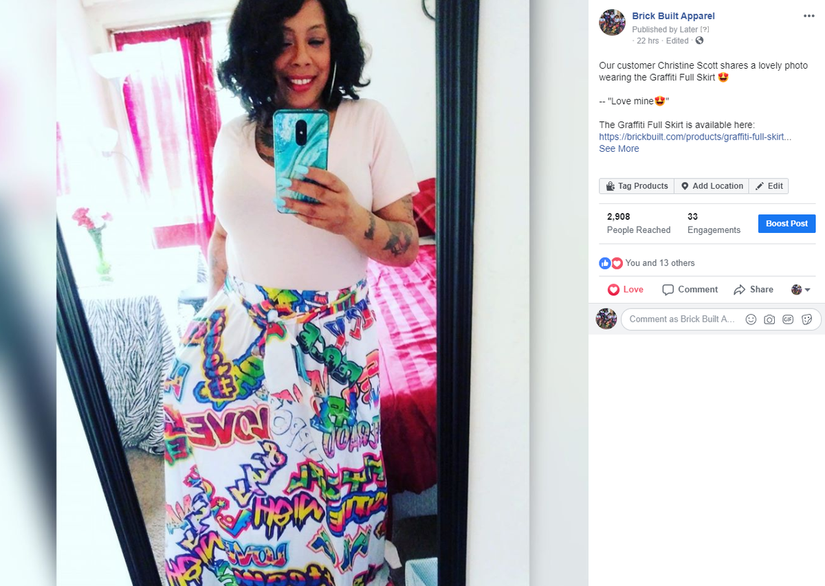 Our customer shared a multi-colored Graffiti full skirt with a vibrant print, featuring an elastic waist and tie belt.